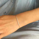 Wrist wearing Curved Bar with CZ gold Bracelet