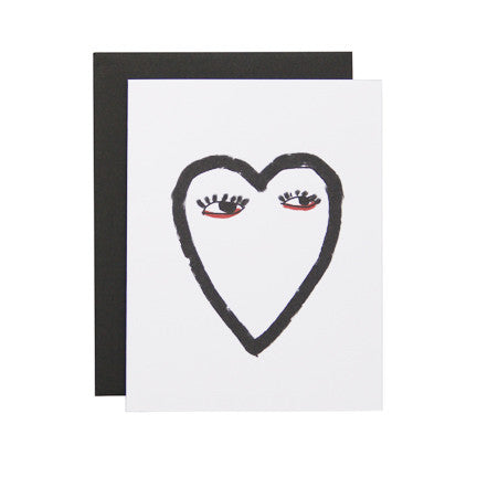 Postcard with an artwork of a heart with eyes